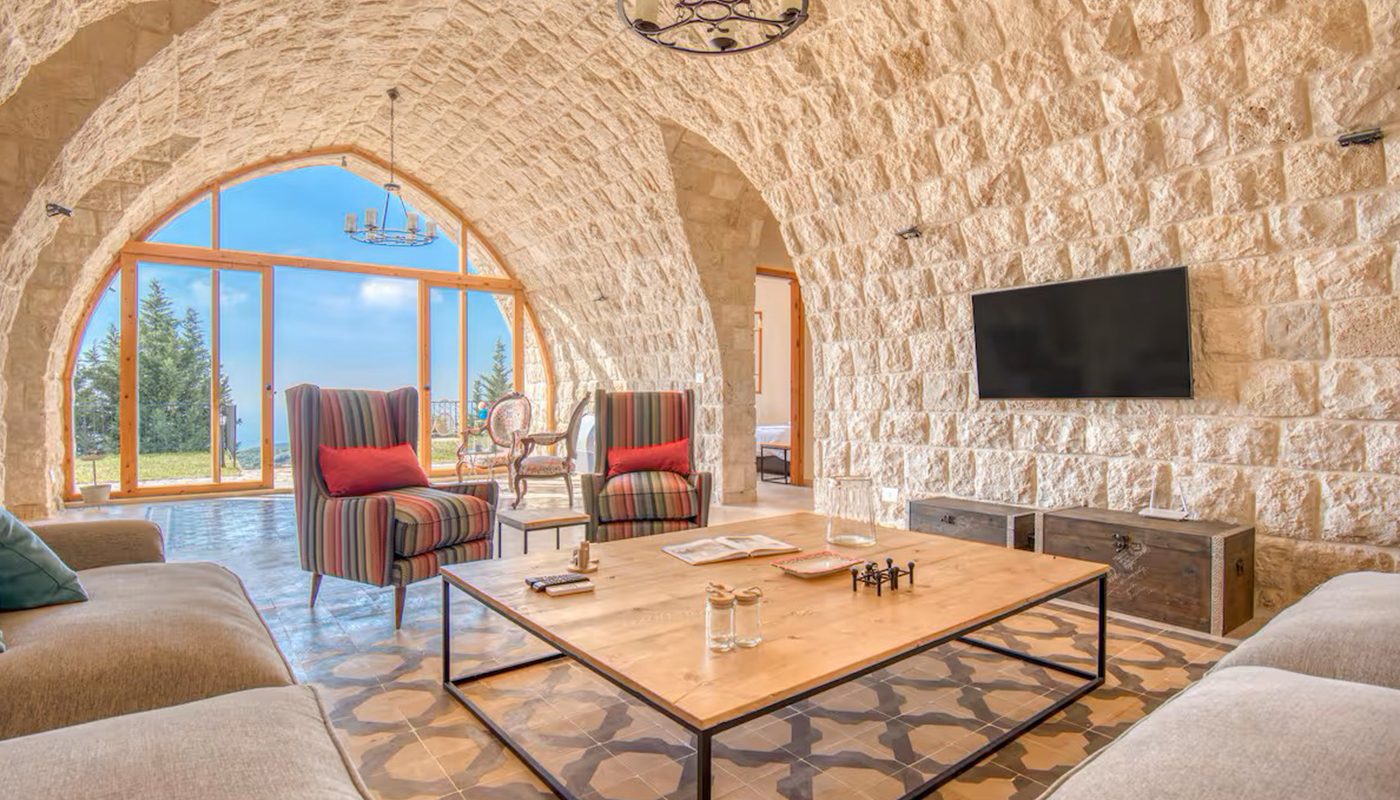Vaulted stone salon of a private villa built by El Jaroudi overlooking the Lebanese mountains