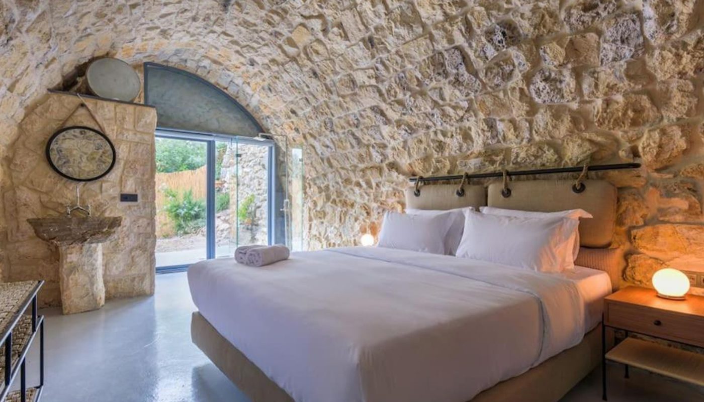Stone vaulted bedroom in a villa built by El Jaroudi